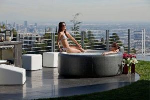 Two women in a balcony spa